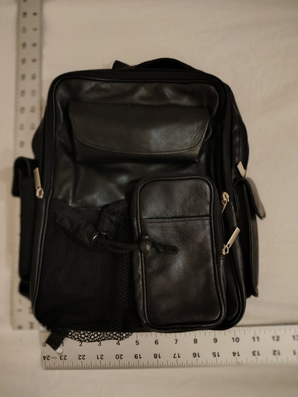1990's vintage Wilson's leather backpack with several pockets for sunglasses, ph